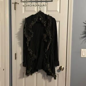Venus cardigan sweater with fur trim around the collar and down the front.